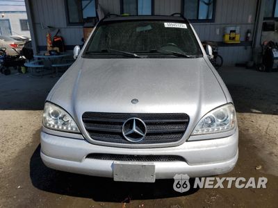 Piąte zdjęcie samochodu w środku: 2000 MERCEDES-BENZ ML 320 VIN:4JGAB54E3YA200180 - miniatura