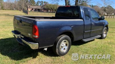 Czwarte zdjęcie samochodu z boku: 2002 FORD F150 VIN:1FTRX17W72NB36764 - miniatura