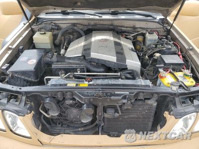 Zdjęcie 13 z 14 samochodu: 1999 LEXUS LX 470 VIN:JT6HT00WXX0029019 - miniatura