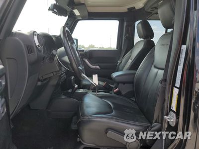 Zdjęcie 7 z 14 samochodu: 2016 JEEP WRANGLER UNLIMITED SAHARA VIN:1C4HJWEG5GL179590 - miniatura