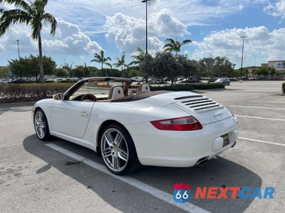 Trzecie zdjęcie samochodu z tyłu: 2007 PORSCHE 911 NEW GENERATION CARRERA CABRIOLET VIN:WP0CA29937S765208 - miniatura