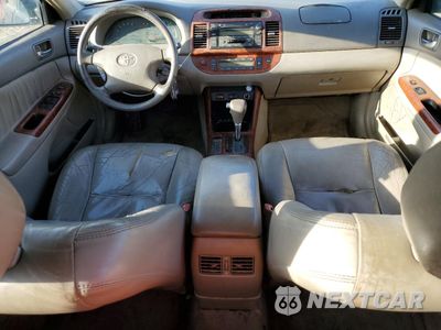 Zdjęcie 8 z 12 samochodu: 2004 TOYOTA CAMRY LE VIN:4T1BF30K34U064215 - miniatura