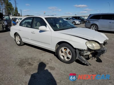 Czwarte zdjęcie samochodu z boku: 1999 HYUNDAI SONATA GLS VIN:KMHWF35V7XA113152 - miniatura