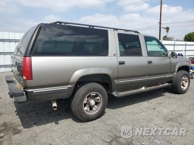 Trzecie zdjęcie samochodu z tyłu: 1999 GMC SUBURBAN K2500 VIN:1GDGK26J6XJ777755 - miniatura