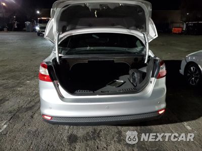 Zdjęcie 6 z 12 samochodu: 2013 FORD FOCUS TITANIUM VIN:1FADP3J29DL138645 - miniatura