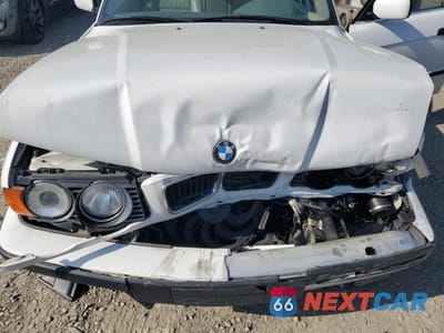 Zdjęcie 11 z 13 samochodu: 1995 BMW 540 I VIN:WBAHE5328SGA64005 - miniatura