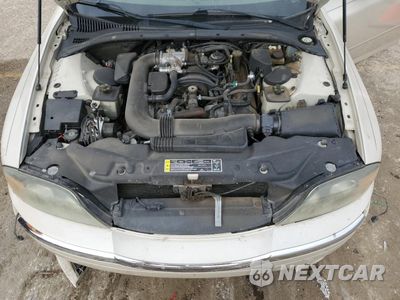 Zdjęcie 12 z 14 samochodu: 2002 LINCOLN LS VIN:1LNHM87A02Y632498 - miniatura