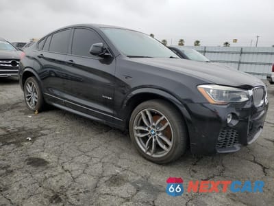 Czwarte zdjęcie samochodu z boku: 2016 BMW X4 XDRIVE35I VIN:5UXXW5C50G0N93000 - miniatura