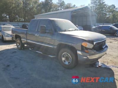 Czwarte zdjęcie samochodu z boku: 2000 GMC NEW SIERRA C2500 VIN:1GTFC29U6YE354641 - miniatura