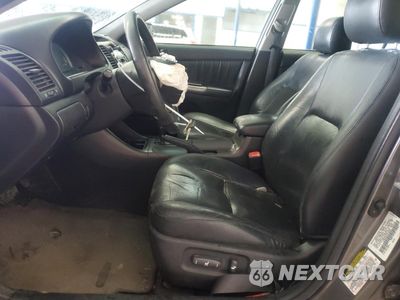 Zdjęcie 7 z 13 samochodu: 2004 TOYOTA CAMRY LE VIN:4T1BE30K44U876691 - miniatura