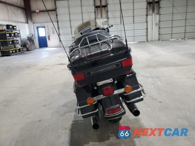 Czwarte zdjęcie samochodu z boku: 2009 HARLEY-DAVIDSON FLHTCU VIN:1HD1FL4129Y665065 - miniatura