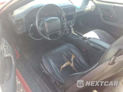 Zdjęcie 8 z 14 samochodu: 2001 CHEVROLET CAMARO VIN:2G1FP22K112118017 - miniatura