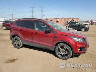 Czwarte zdjęcie samochodu z boku: 2019 FORD ESCAPE SEL VIN:1FMCU9HD0KUA92800 - miniatura