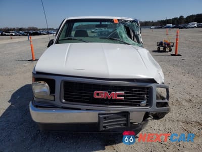 Piąte zdjęcie samochodu w środku: 1997 GMC SIERRA C1500 VIN:1GTEC14W9VZ528236 - miniatura