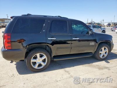 Trzecie zdjęcie samochodu z tyłu: 2012 CHEVROLET TAHOE C1500 LT VIN:1GNSCBE07CR166544 - miniatura