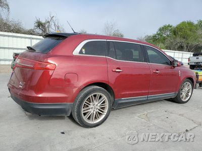 Trzecie zdjęcie samochodu z tyłu: 2013 LINCOLN MKT VIN:2LMHJ5AT7DBL50249 - miniatura
