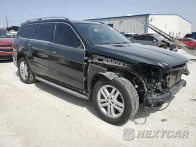 Czwarte zdjęcie samochodu z boku: 2014 MERCEDES-BENZ GL 450 4MATIC VIN:4JGDF7CE7EA364462 - miniatura