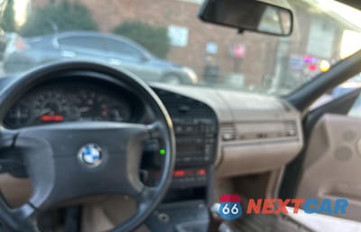 Zdjęcie 9 z 11 samochodu: 1999 BMW 323 IC VIN:WBABJ7333XEA18932 - miniatura