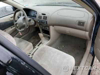 Zdjęcie 8 z 12 samochodu: 2001 TOYOTA COROLLA CE VIN:1NXBR12E21Z461199 - miniatura