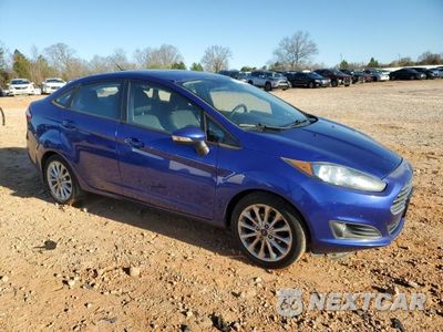 Czwarte zdjęcie samochodu z boku: 2014 FORD FIESTA SE VIN:3FADP4BJ9EM165291 - miniatura
