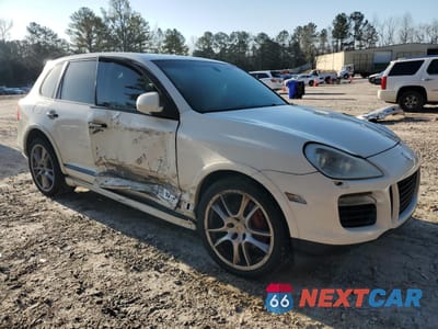 Czwarte zdjęcie samochodu z boku: 2010 PORSCHE CAYENNE GTS VIN:WP1AD2AP0ALA61671 - miniatura