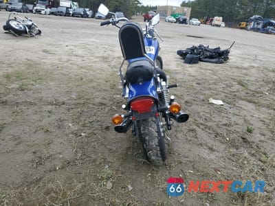 Czwarte zdjęcie samochodu z boku: 2005 KAWASAKI EN500 C VIN:JKAENVC185A190554 - miniatura