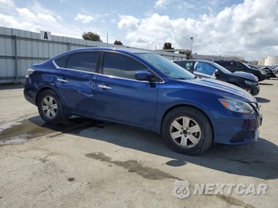 Czwarte zdjęcie samochodu z boku: 2018 NISSAN SENTRA S VIN:3N1AB7AP9JY267540 - miniatura