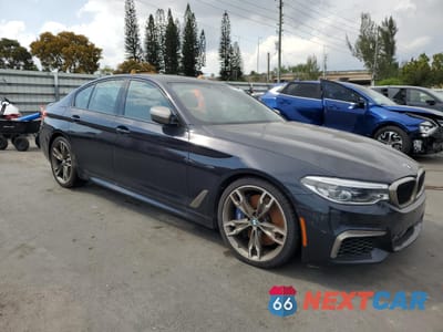 Czwarte zdjęcie samochodu z boku: 2020 BMW M550XI VIN:WBAJS7C04LBN96223 - miniatura