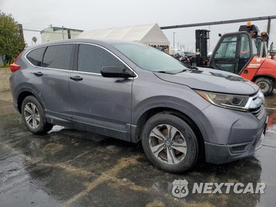 Czwarte zdjęcie samochodu z boku: 2018 HONDA CR-V LX VIN:2HKRW5H39JH410477 - miniatura