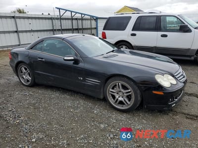 Czwarte zdjęcie samochodu z boku: 2004 MERCEDES-BENZ SL 500 VIN:WDBSK75F14F082802 - miniatura