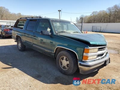 Czwarte zdjęcie samochodu z boku: 1995 CHEVROLET SUBURBAN C1500 VIN:3GNEC16K3SG115127 - miniatura