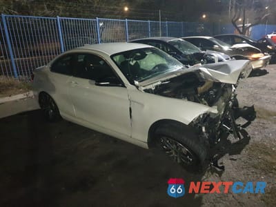 Czwarte zdjęcie samochodu z boku: 2015 BMW 228 I VIN:WBA1F5C54FV257419 - miniatura