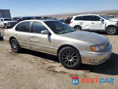 Czwarte zdjęcie samochodu z boku: 1999 INFINITI I30 VIN:JNKCA21AXXT776026 - miniatura