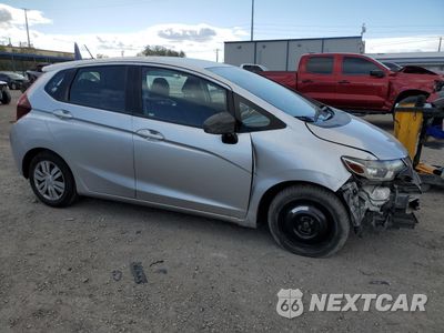Czwarte zdjęcie samochodu z boku: 2016 HONDA FIT LX VIN:JHMGK5H58GX011625 - miniatura