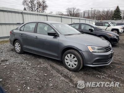 Czwarte zdjęcie samochodu z boku: 2015 VOLKSWAGEN JETTA BASE VIN:3VW1K7AJ6FM278922 - miniatura