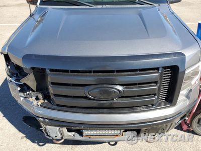 Zdjęcie 12 z 14 samochodu: 2011 FORD F150 SUPER CAB VIN:1FTFX1EF5BFC82564 - miniatura