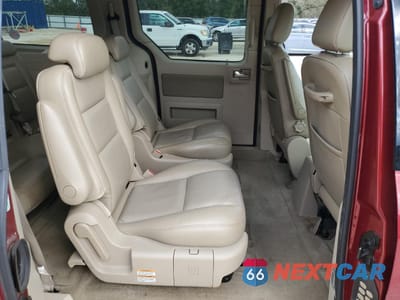 Zdjęcie 12 z 16 samochodu: 2004 FORD FREESTAR LIMITED VIN:2FMDA58274BB23201 - miniatura