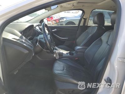 Zdjęcie 7 z 12 samochodu: 2014 FORD FOCUS TITANIUM VIN:1FADP3J22EL135247 - miniatura