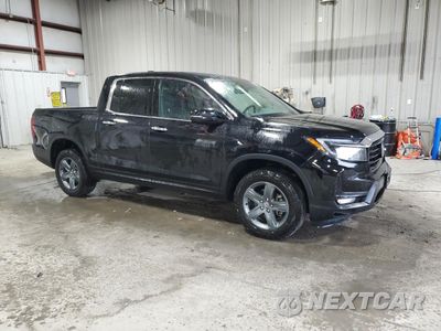Czwarte zdjęcie samochodu z boku: 2023 HONDA RIDGELINE RTL-E VIN:5FPYK3F76PB029699 - miniatura