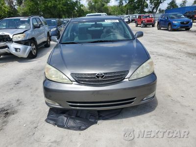 Piąte zdjęcie samochodu w środku: 2004 TOYOTA CAMRY LE VIN:4T1BE32K34U801624 - miniatura