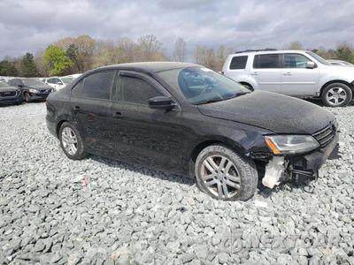 Czwarte zdjęcie samochodu z boku: 2018 VOLKSWAGEN JETTA S VIN:3VW2B7AJ7JM223327 - miniatura