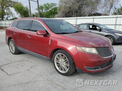 Czwarte zdjęcie samochodu z boku: 2013 LINCOLN MKT VIN:2LMHJ5AT7DBL50249 - miniatura