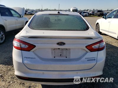 Zdjęcie 6 z 12 samochodu: 2013 FORD FUSION TITANIUM HEV VIN:3FA6P0RU2DR362919 - miniatura