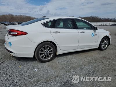 Trzecie zdjęcie samochodu z tyłu: 2017 FORD FUSION SE HYBRID VIN:3FA6P0LU3HR409678 - miniatura