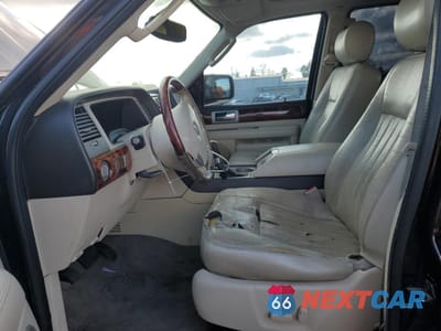 Zdjęcie 7 z 13 samochodu: 2003 LINCOLN NAVIGATOR VIN:5LMFU28R03LJ49484 - miniatura