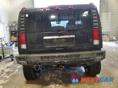 Zdjęcie 6 z 15 samochodu: 2005 HUMMER H2 VIN:5GRGN23UX5H120888 - miniatura