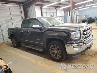 Czwarte zdjęcie samochodu z boku: 2018 GMC SIERRA K1500 SLT VIN:1GTV2NEC4JZ280664 - miniatura