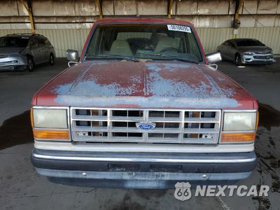 Piąte zdjęcie samochodu w środku: 1990 FORD BRONCO II VIN:1FMCU12T1LUA11502 - miniatura