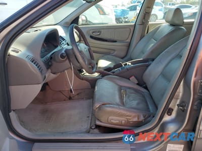 Zdjęcie 7 z 14 samochodu: 2003 NISSAN MAXIMA GLE VIN:JN1DA31A83T411224 - miniatura