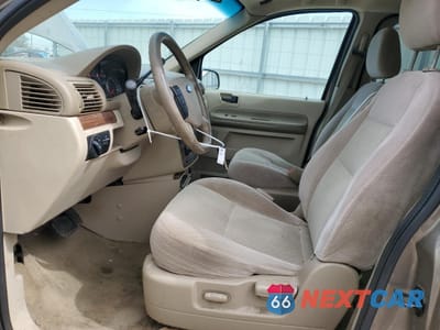 Zdjęcie 7 z 13 samochodu: 2005 FORD FREESTAR SEL VIN:2FMZA52275BA75957 - miniatura